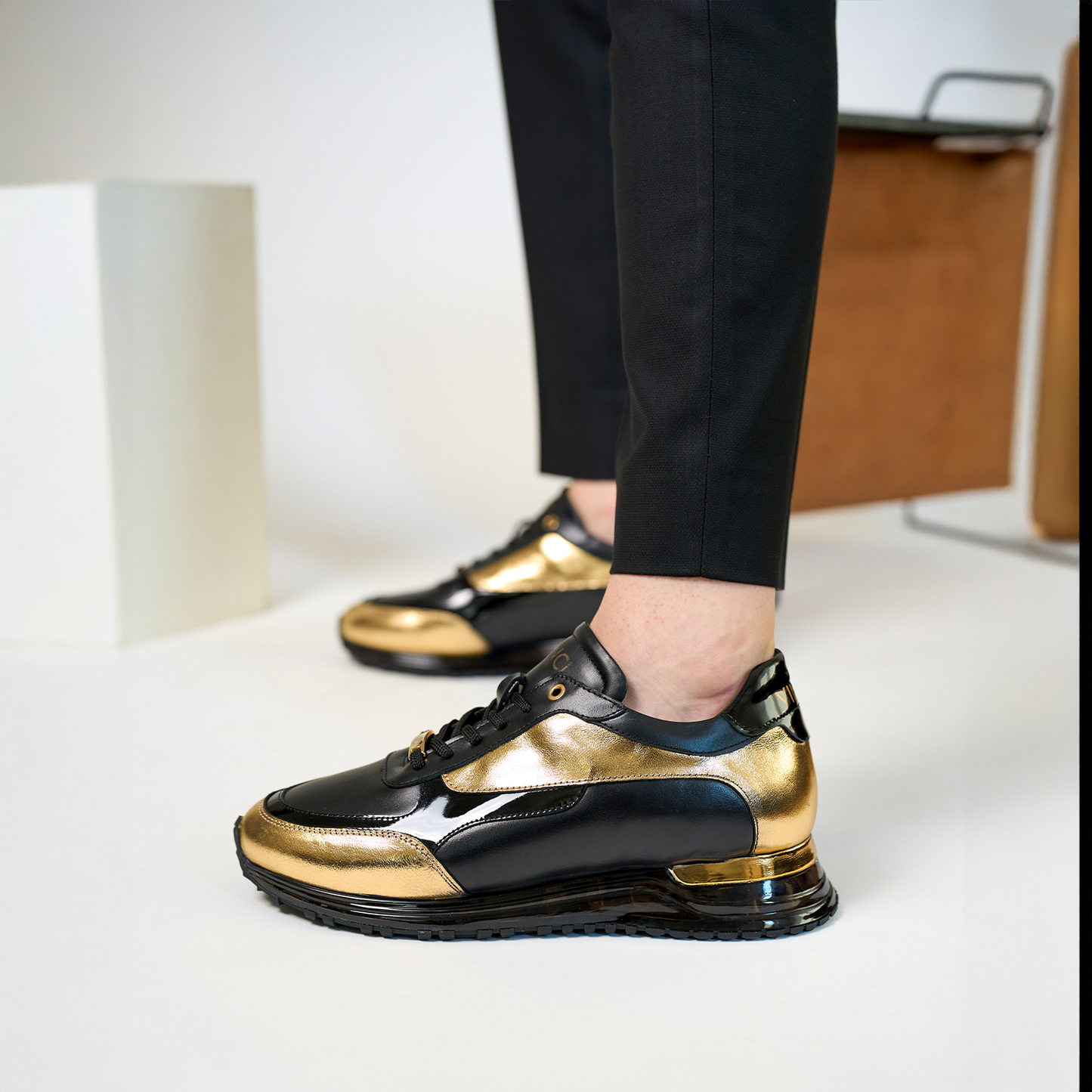 The Arda Black & Gold Leather Men Sneaker